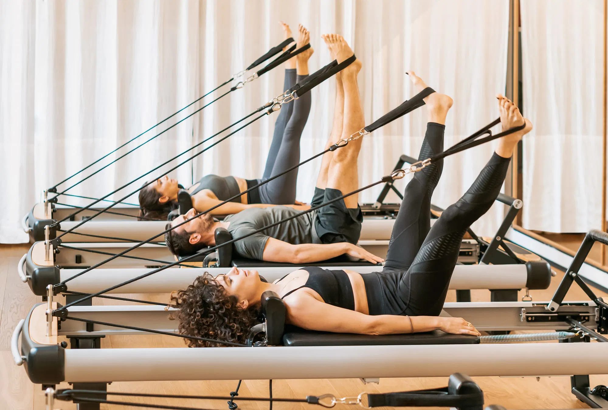 Lezione di gruppo al reformer